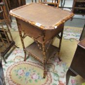 A bamboo occasional table.