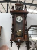 An ornately carved wall clock