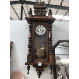 An ornately carved wall clock