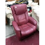 A red leather reclining chair