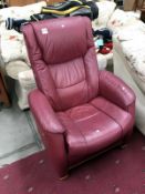 A red leather reclining chair