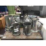 A collection of pewterware including a tray,
