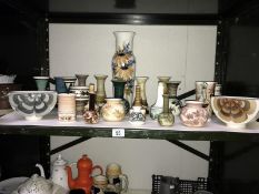 24 pieces of Jersey pottery vases