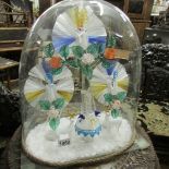 A fine glass diorama of exotic birds, deer and fountain under glass dome.