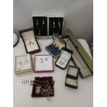 A mixed lot of pendant and earring sets, earrings etc.