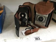 A boxed Brownie camera & a Brownie Reflex camera