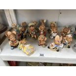A collection of 15 Pendelfin figurines including fireman & postie
