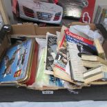 A box of R.A.F and aviation memorabilia including postcards, books etc.