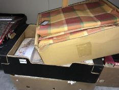 2 boxes of linen and a box of curtains