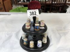 15 Minton thimbles with original thimble stand