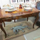 An inlaid writing table.