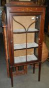 An Edwardian inlaid display cabinet.