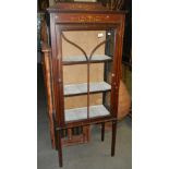 An Edwardian inlaid display cabinet.