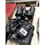 Two sets of binoculars - A Swift Saratoga and a Boots Admiral 4