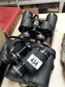 Two sets of binoculars - A Swift Saratoga and a Boots Admiral 4