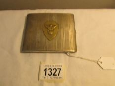 A silver cigarette case with German hall mark (900) and a Swastika emblem,.
