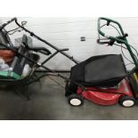 A petrol lawn mower Honda GCV135 4.