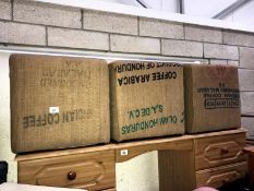 3 cuboid seats with coffee advertising hessian covers