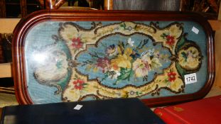 A Victorian tapestry panel in a glazed wood frame, tapestry 48 x 20 cm, frame 53 x 26 cm.