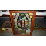 A cased display of vintage tins.