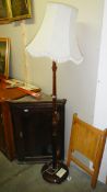 A standard lamp with shade.