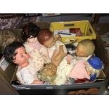 A box of old dolls.