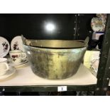 A large Victorian brass jam pan