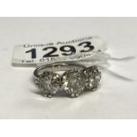 A platinum 3 stone diamond ring, 5.55ct in total, size O.