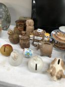 A quantity of stoneware pottery money boxes