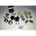 A quantity of earrings including Butler and Wilson,