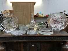 A collection of decorative glass serving vessels, plates, bowls, decanter etc.