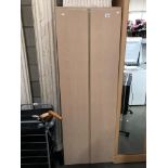 A thin double doored wardrobe