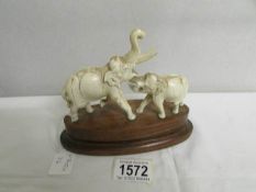 2 19th century carved ivory elephants on base.