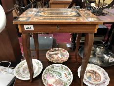 A small inlaid marquetry musical work table