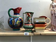 4 colourful pottery items consisting of 3 jugs & a lidded pot
