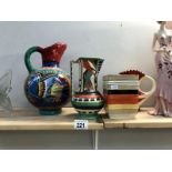 4 colourful pottery items consisting of 3 jugs & a lidded pot