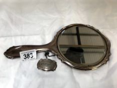 A silver back mirror & silver whisky label (both Hallmarked)