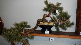 A ornamental artificial Japanese bonsai.