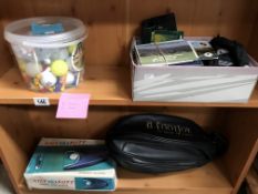 2 shelves of golfing items