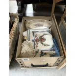 A box of old embroidery, vintage linen etc.