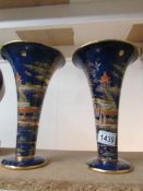 A pair of Carlton ware Chinese style vases.