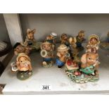 A collection of 11 Pendelfin Bunnykins including April, Woody & Flag Maker etc.