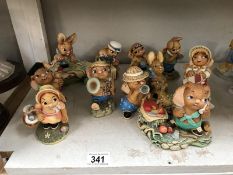 A collection of 11 Pendelfin Bunnykins including April, Woody & Flag Maker etc.