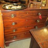 A 4 drawer mahogany chest.