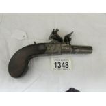 An old flintlock pistol with folding trigger by Clark of London, in good condition.