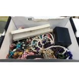 A box of assorted costume jewellery