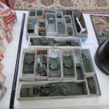 A large quantity of play worn Dinky military vehicles.