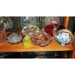 4 coloured glass dishes and 2 glass paperweights.