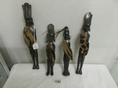 4 tribal figures.