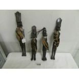 4 tribal figures.